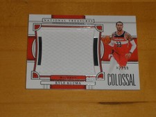 2022-23 National Treasures Colossal Game Used Jersey #KWK Kyle Kuzma 02/99