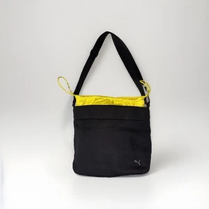 Borsa a tracolla Puma nera e gialla con chiusura a coulisse - Foto 1 di 6