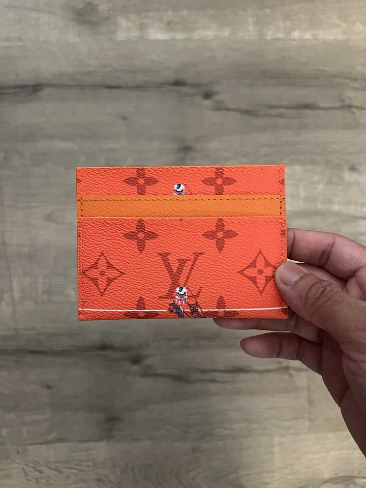 Portatarjetas de tenis Louis Vuitton naranja Foto 1 de 3