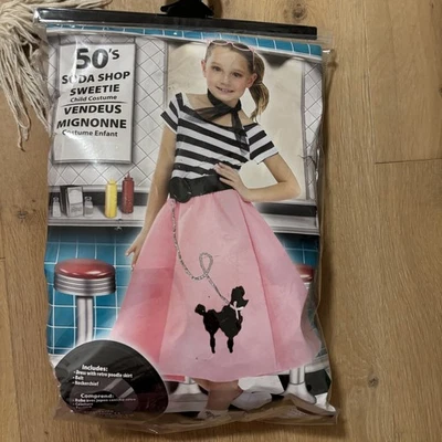 Sweetie de tienda de refrescos para niñas de los años 50. Disfraz de falda caniche. Rosa. Niña Talla 8-10 Foto 1 de 4