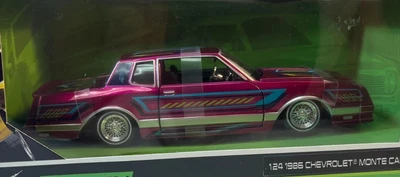 MAISTO LOWRIDERS 1:24 1986 MONTE CARLO SS METALLIC MAGENTA NOT IN PRODUCTION NEW - Image 1 of 3