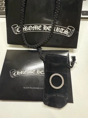 Corazones cromados F***You Ring 2001, con bolsa de papel y otros Foto 1 de 4