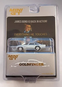 MINI GT 1/64 ASTON MARTIN DB5 RHD GOLDFINGER INGLÉS MGT00900-007E - DAÑADO - Imagen 1 de 3