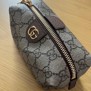 Gucci marsupio doppio logo G tela cerniera oro usato con scatola e borsa - Foto 1 di 10