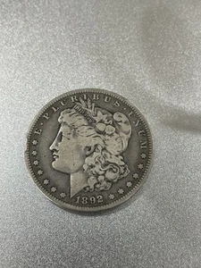 1892 Morgan Dollar  - Picture 1 of 8