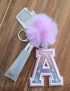 Claire’s Pink Glitter Initial Letter "A" With Clear Glitter Lipgloss Keychain - Picture 1 of 2