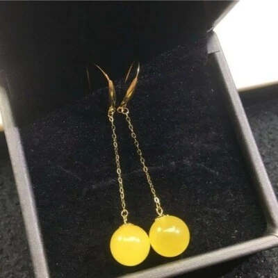 Crazy deal! Solid 18K gold and  genuine egg yolk Amber ear hooks!! - Image 1 of 2