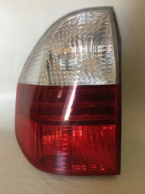 BMW X3 2008 lado izquierdo del conductor trasero exterior luz de freno lámpara lente OEM 7162211 Foto 1 de 4