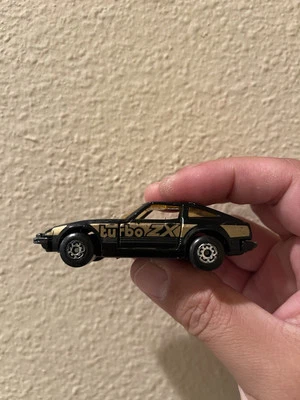 Matchbox Datsun 280 ZX Turbo 1982 de colección negro y dorado Foto 1 de 4