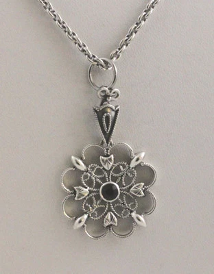 Circular Sterling Starburst Necklace 24 mm with 4mm Onyx Center with 18" Chain - Image 1 of 2