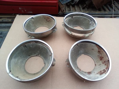 Oldsmobile 1965 juego de 4 cucharones y anillos de faros GM Foto 1 de 4