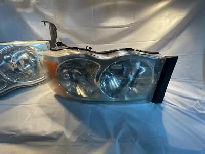 Par de faros delanteros transparentes para Dodge Ram 2002-2008 tercera generación 1500 2500 3500 OEM Foto 1 de 4