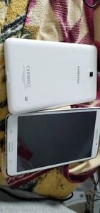 2Stück Samsung Galaxy Tab 4 Mini SM-T230 8GB, WLAN, 17,8 cm (7 Zoll) - Weiß - Bild 1 von 8