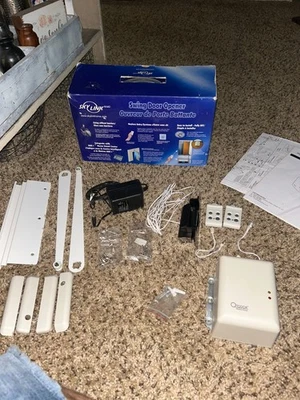 Skylink DM-150 Automatic Swing Door Opener System Install Kit with Remotes READ - Image 1 of 4