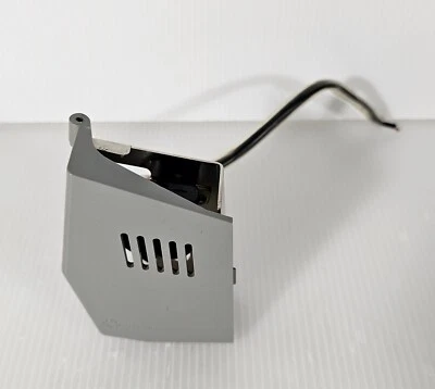 ELNA Lock L5, LIGHT REFLECTOR DOOR ASSEMBLY, Genuine Original Serger Part OEM - Image 1 of 4