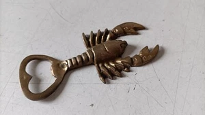 APRIBOTTIGLIE IN OTTONE A FORMA DI ARAGOSTA - VINTAGE DA COLLEZIONE - Picture 1 of 5