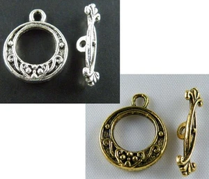 50 juegos de broches redondos de plata/oro tibetano con flores 19,5x15,5x3,5 mm 1081 - Imagen 1 de 3