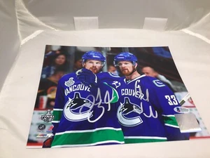 Henrik & Daniel Sedin Signed Vancouver Canucks 8x10 Photo Beckett BAS COA 1A - Picture 1 of 5