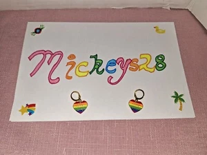 Huggie Earrings Rainbow Heart Says Love Wins LGBTQ+ - Picture 1 of 2