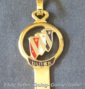 LLAVE BUICK ESMALTADA EN ORO EN BLANCO Y LLAVERO VINTAGE B46 1970 1974 1978 1982 - Imagen 1 de 5