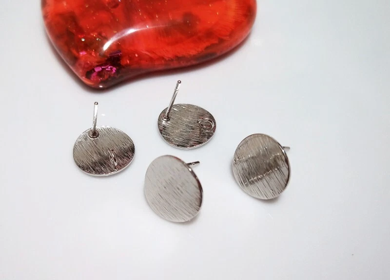 2coppie base orecchini perno tondo in ottone placcato platino vero 12mm bijoux - Immagine 1 di 1