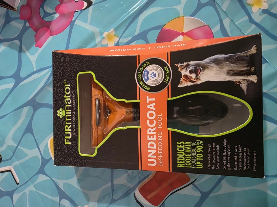 Peine de deshedding mediano FURminator Foto 1 de 2