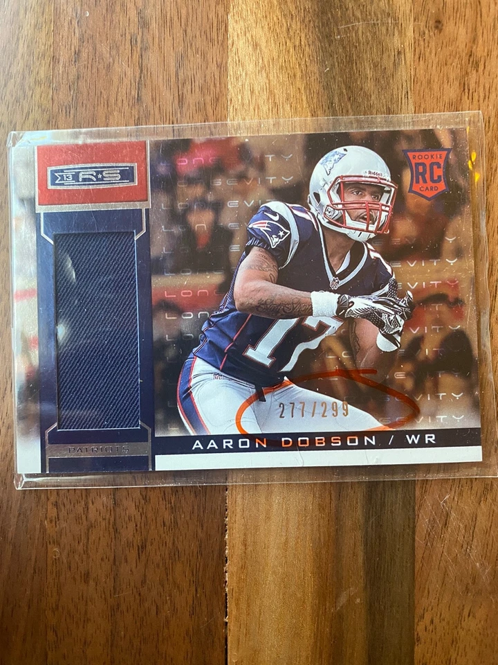 A44,818 -  2013 Rookies & Stars Longevity Parallel #201 Aaron Dobson Jersey/299 - Image 1 of 1
