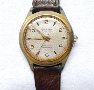 OROLOGIO DA POLSO VINTAGE MECCANICO 1950 HANILUXE FUNZIONA 33MM CAL BRAC 2003 - Picture 1 of 9