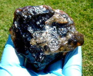 Meteorito de vidrio del desierto libio tectita espécimen de impacto (930 crt) gema negra oscura A - Imagen 1 de 9
