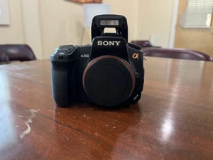 Sony DSLR a300 Camera Body with batteries and book - Picture 1 of 9