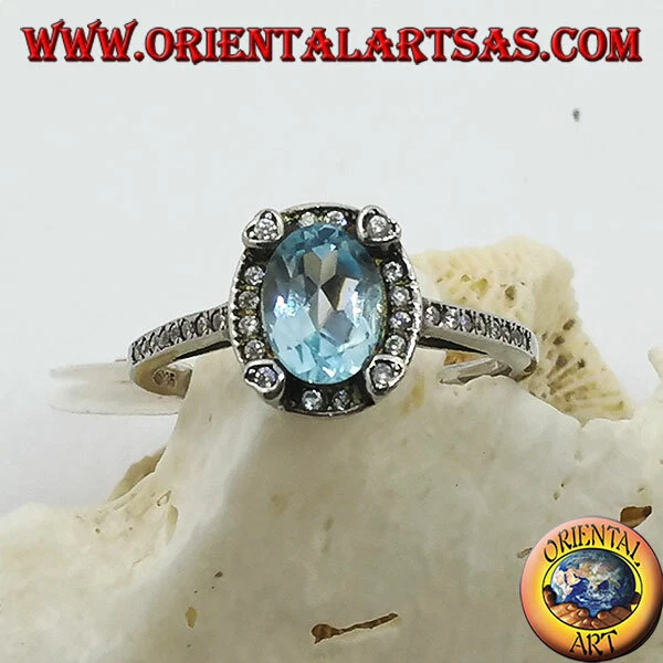 Anello in argento 925 ‰ blu topazio naturale ovale incastonato contorno zirconi - Immagine 1 di 1
