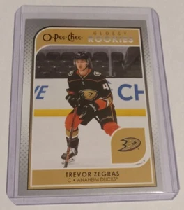 Trevor Zegras 2021-22 O-Pee-Chee Glossy Rookies (JuBe) #R-8 Anaheim Ducks - Bild 1 von 2
