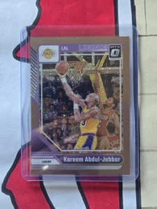 Kareem Abdul Jabbar - Bronze Glitter /99 #228 - 2024-25 Panini Optic NBA - Lakers - Bild 1 von 2