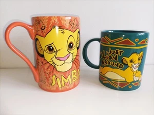 2 Lion King Mugs Disney Cup "Just Lion Around" Simba Timon & Pumba & "Born Wild" - Picture 1 of 13