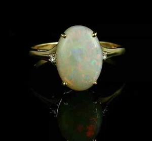 Anello di fidanzamento ovale 3 ct creato in laboratorio opale di fuoco e diamanti placcato oro giallo 14 carati - Foto 1 di 7