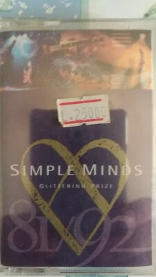 SIMPLE MINDS - GLITTERING PRIZE - MC MUSICASSETTA - NUOVA SIGILLATATA - Immagine 1 di 2