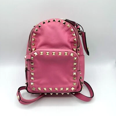 Mini mochila Valentino Garavani Rockstud de cuero rosa para mujer Foto 1 de 4