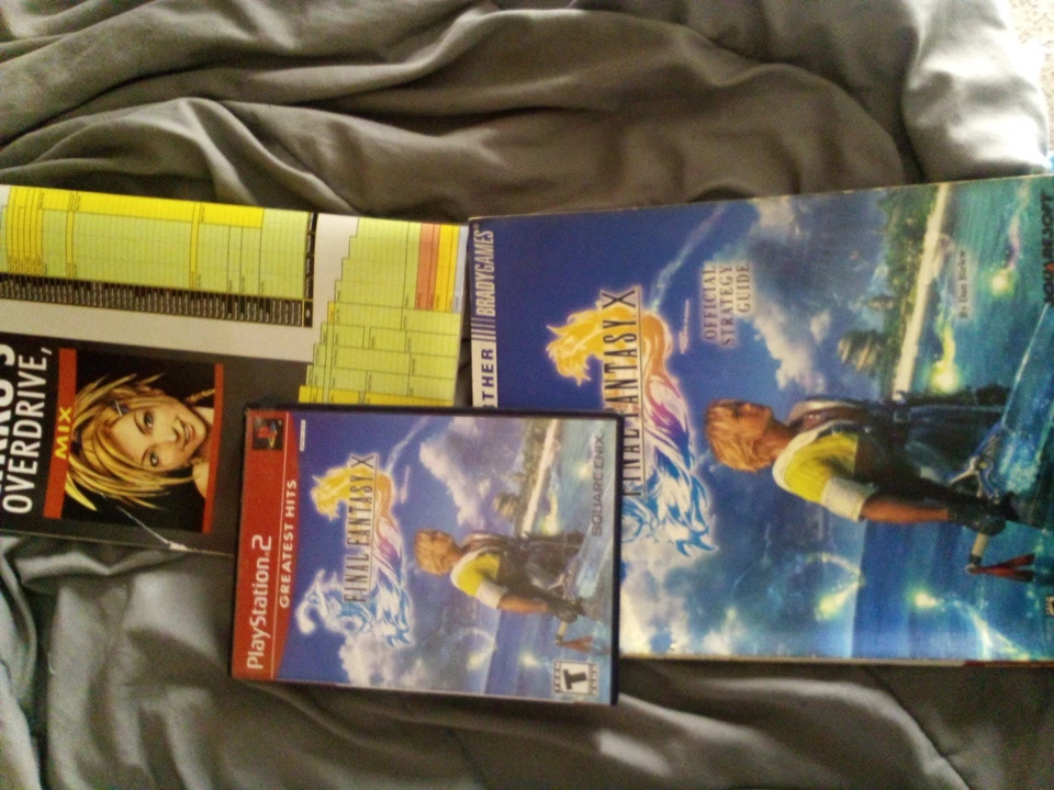Final Fantasy X, Game bundled w/ Official Strategy guide and Map Poster - Image 1 of 4