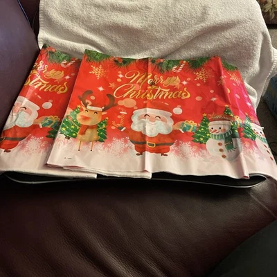 3 Pack Christmas Red w/Santa & Friends,Disposable Plastic 54" X 108" Tablecloths - Image 1 of 2