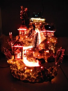 Beleuchtete Deko Figur mehrfarbig Winterszene Harz Weihnachtsdorf - Bild 1 von 13