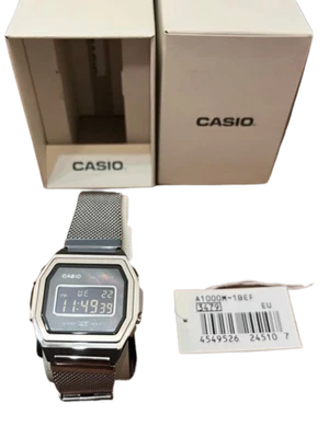 Reloj A1000M-1B ILUMINATOR Digital Premium Vintage Completo Metal Plateado Cara Negra Foto 1 de 4