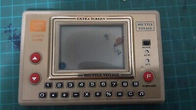 SHUTTLE VOYAGE - LCD VINTAGE HANDHELD TABLETOP ARCADE GAME and WATCH CALCULATOR 