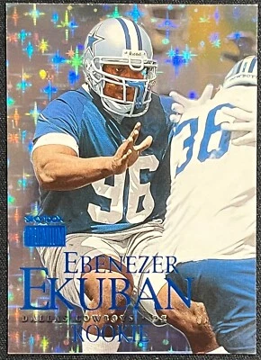 1999 SKYBOX PREMIUM EBENEZER EKUBAN STAR FOIL BLUE #01/15 COWBOYS - Image 1 of 2