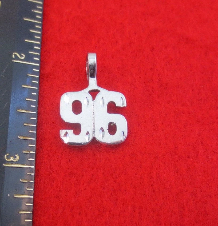 14KT WHITE GOLD EP NUMBER "96" DIAMOND CUT CHARM - Image 1 of 1