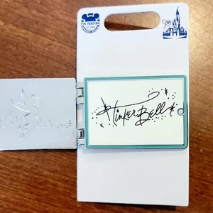Prendedor libro autógrafo Tinker Bell serie 50 bóveda parques Disney World 2021 vintage - Imagen 1 de 2
