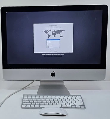 Apple iMac 21,5 pulgadas de escritorio con mouse y teclado Foto 1 de 4