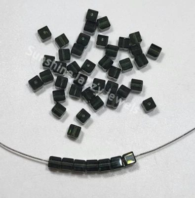 12pc Swarovski Crystal Morion 4mm Faceted Cube 5601 Beads; Dark Gray-Green - Image 1 of 3