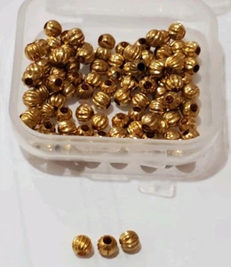 100 piezas. CUENTAS SUELTAS VINTAGE 3 MM ACANALADAS CORREGADAS TONO DORADO, NUEVO STOCK ANTIGUO - Imagen 1 de 3