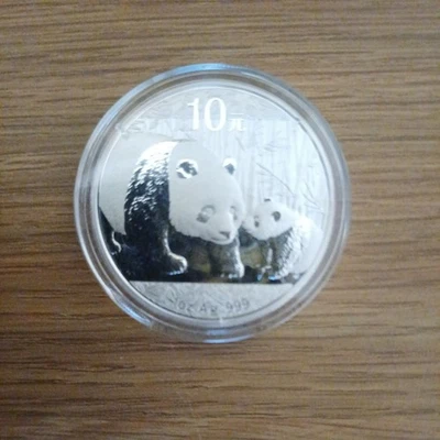2011 1oz Panda Silver Coin 999 in Capsule bullion coin like Britannia  - Image 1 of 3
