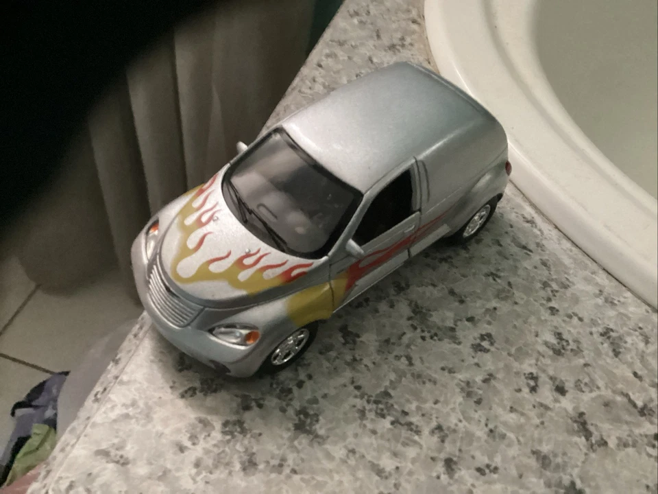 1/32 Chrysler PT Cruiser Silver with Flames Panel Cruiser 2001 - Image 1 of 1